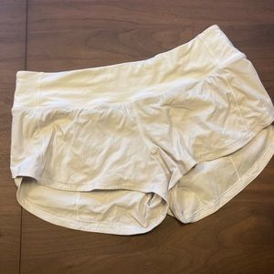White small Lululemon running shorts